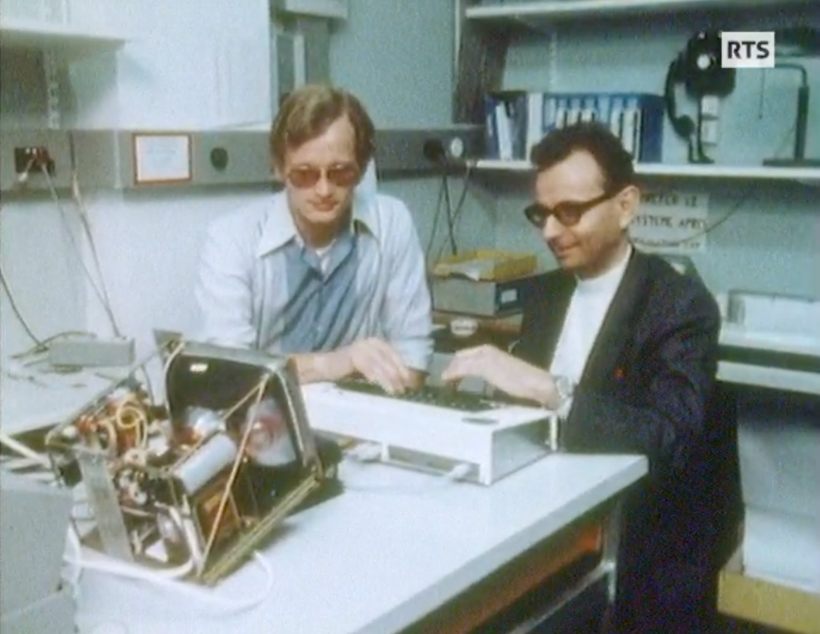 Jean-Claude Nicoud (right) and Marc Forster (left) demonstrating Jeu de gogo at an EPFL Lab in 1979.